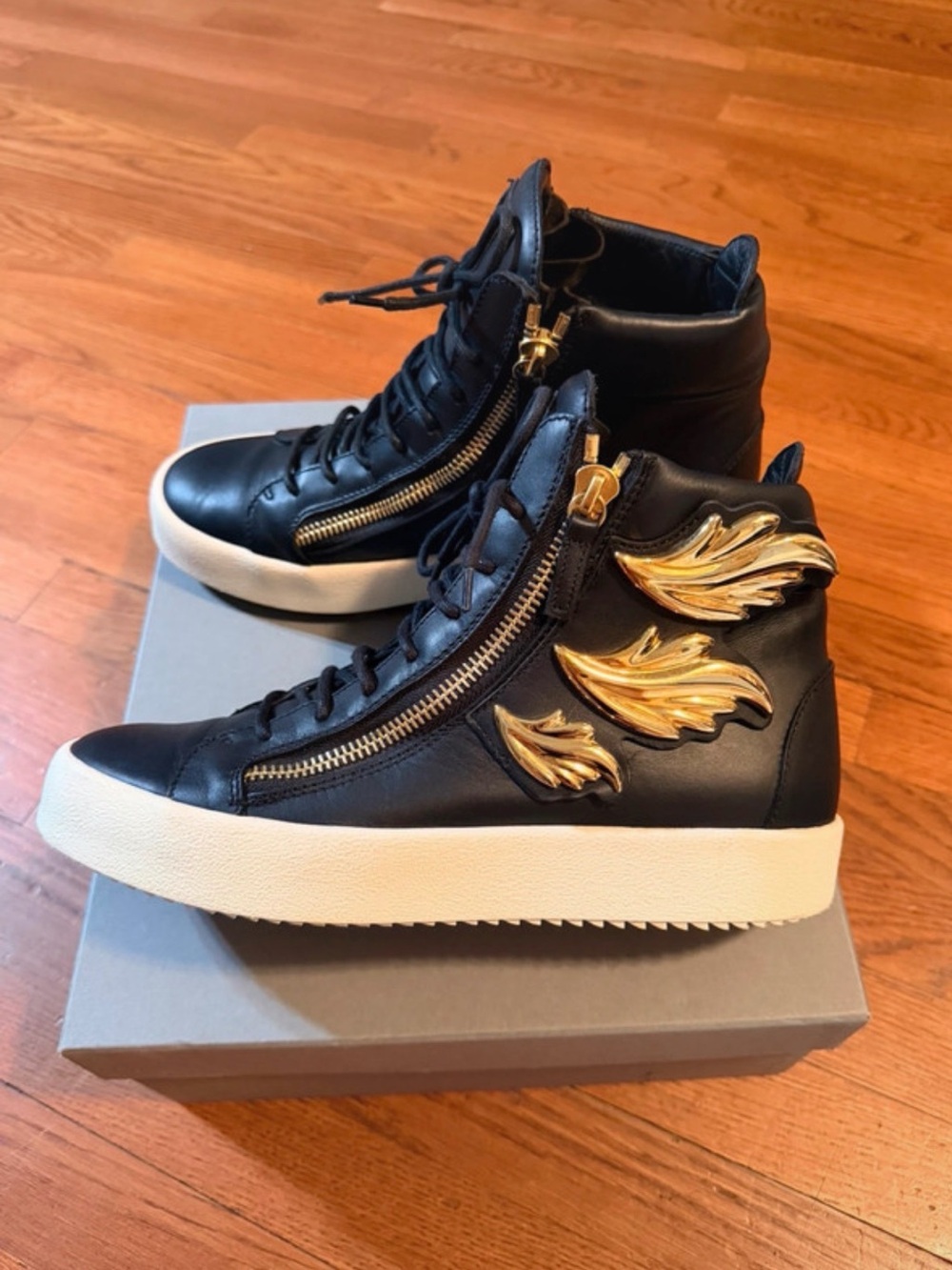 Giuseppe Zanotti Black Leather High-Top Sneakers with Gold Wing Accents